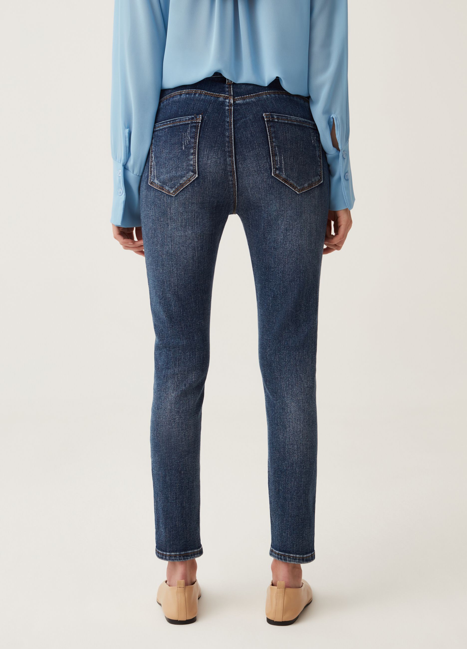 Hybrid slim-fit jeans with worn look