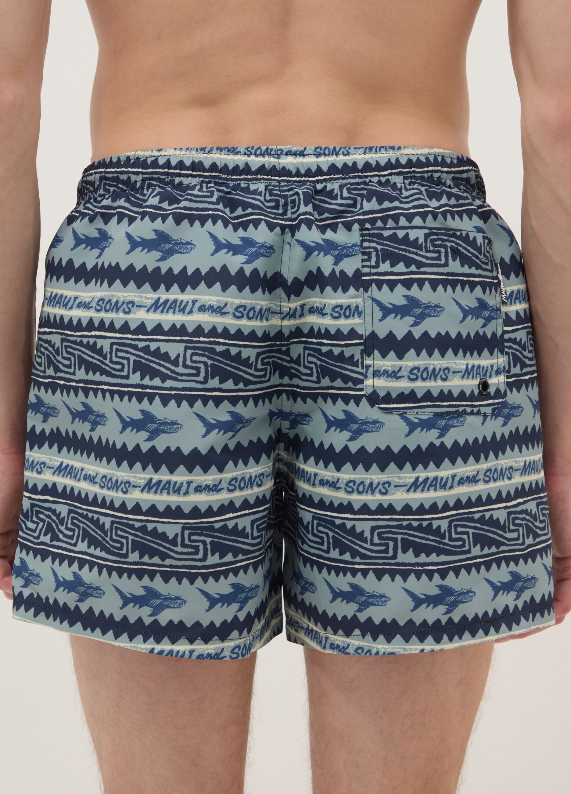 Multicolour swim shorts with sharks and geometric patterns