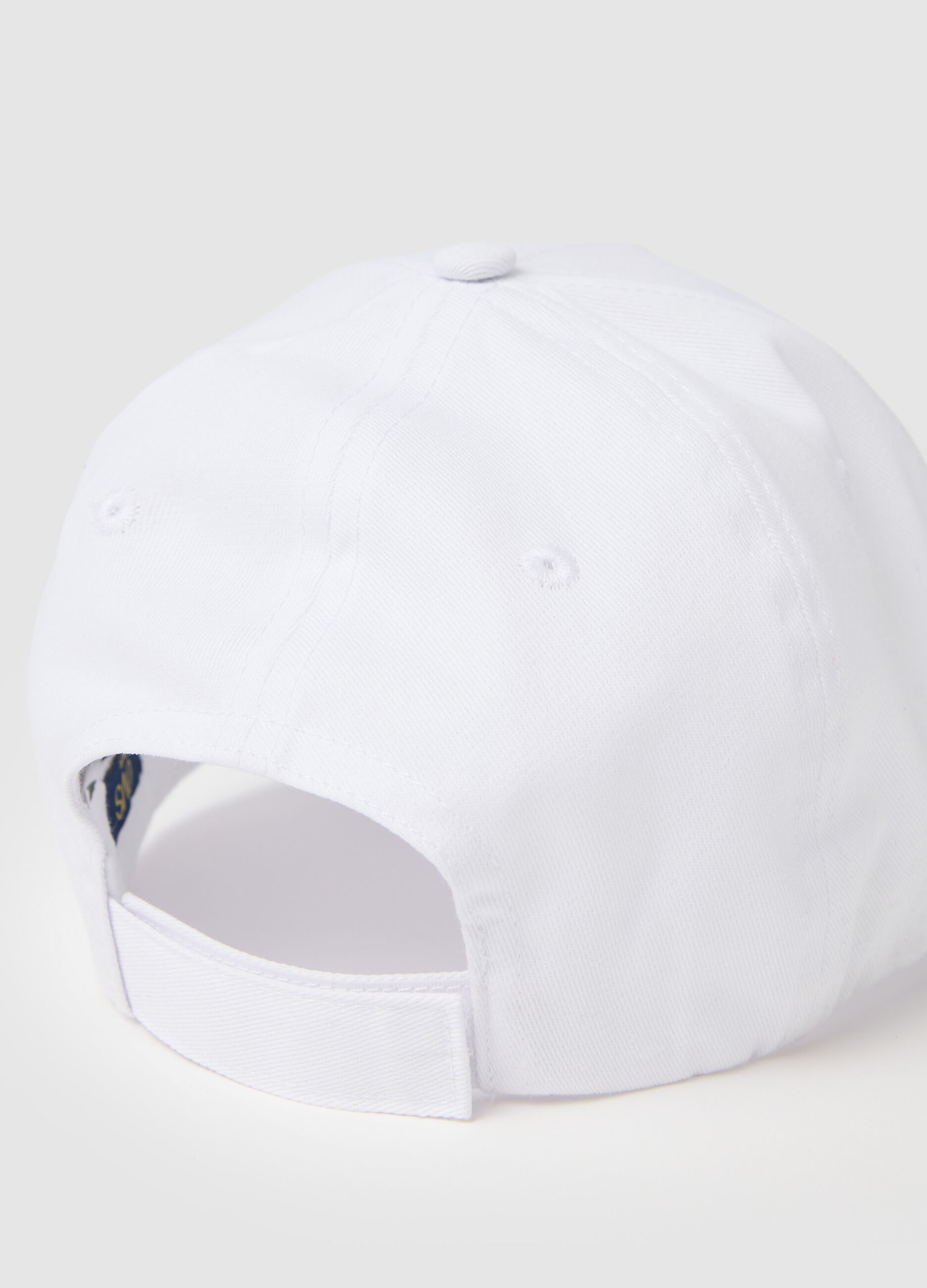 White baseball cap with butterfly embellishment