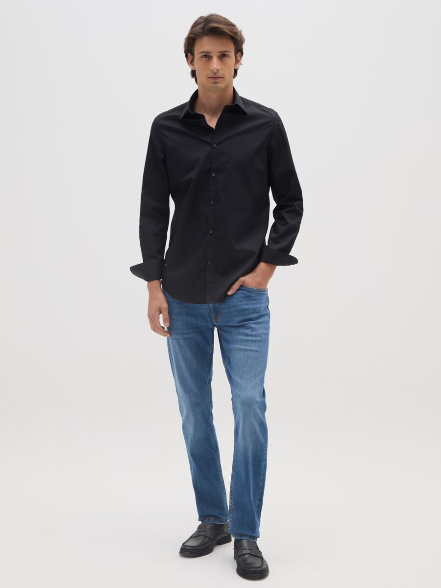Jeans in denim blu in cotone elasticizzato slim fit_0
