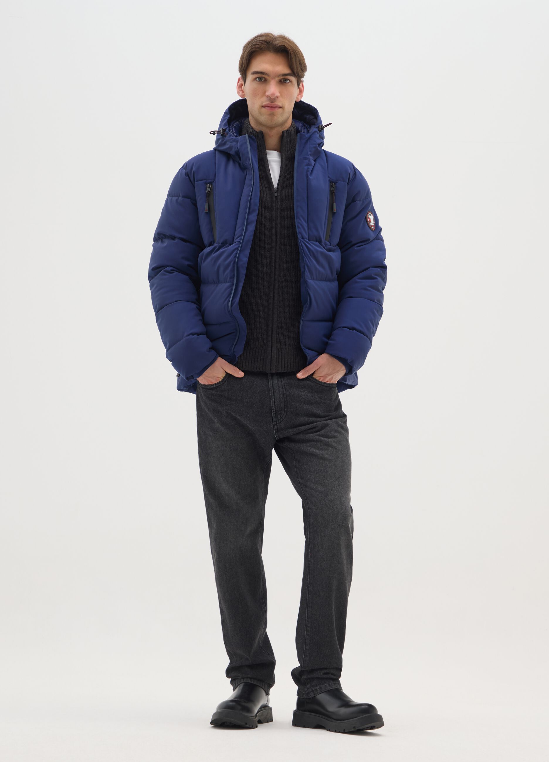 Blue padded jacket with hood and zip