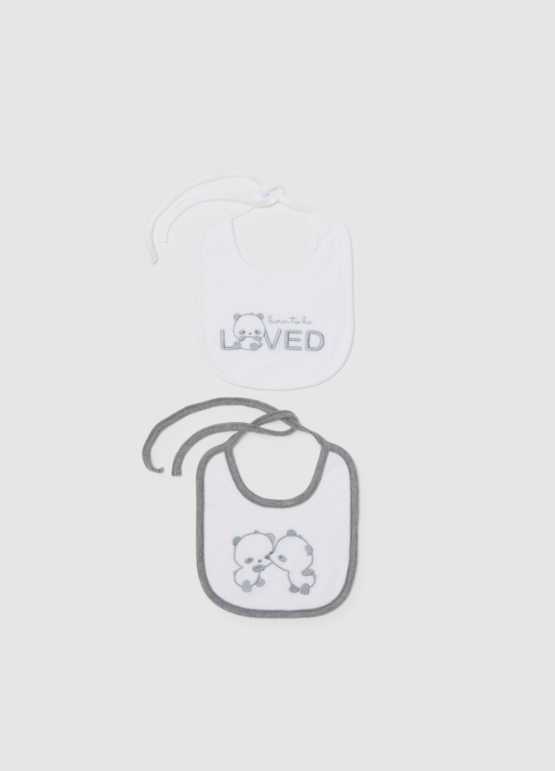 Twin pack baby bibs in white cotton with tie closure
