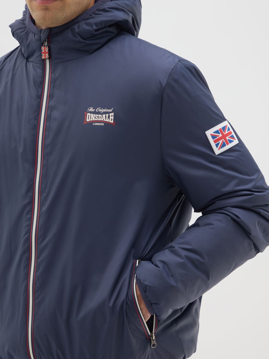 Blue padded jacket with hood and zip_3