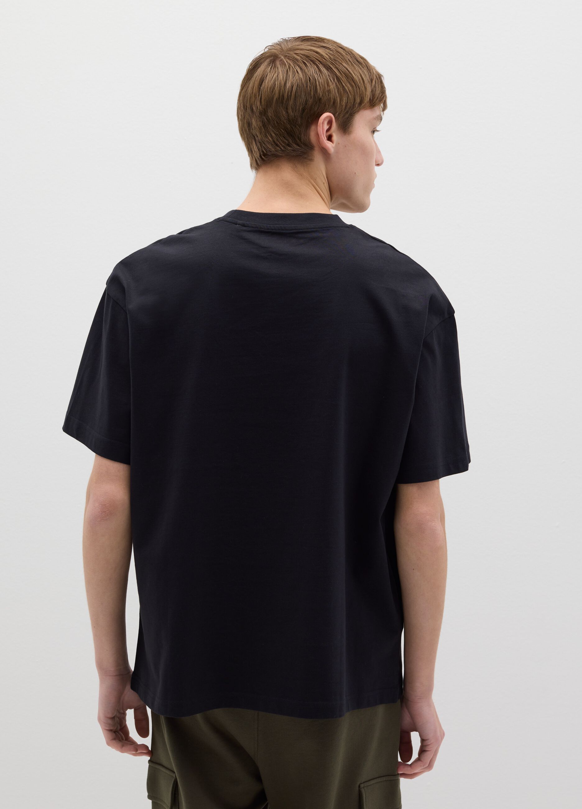 T-shirt in cotone con tasca