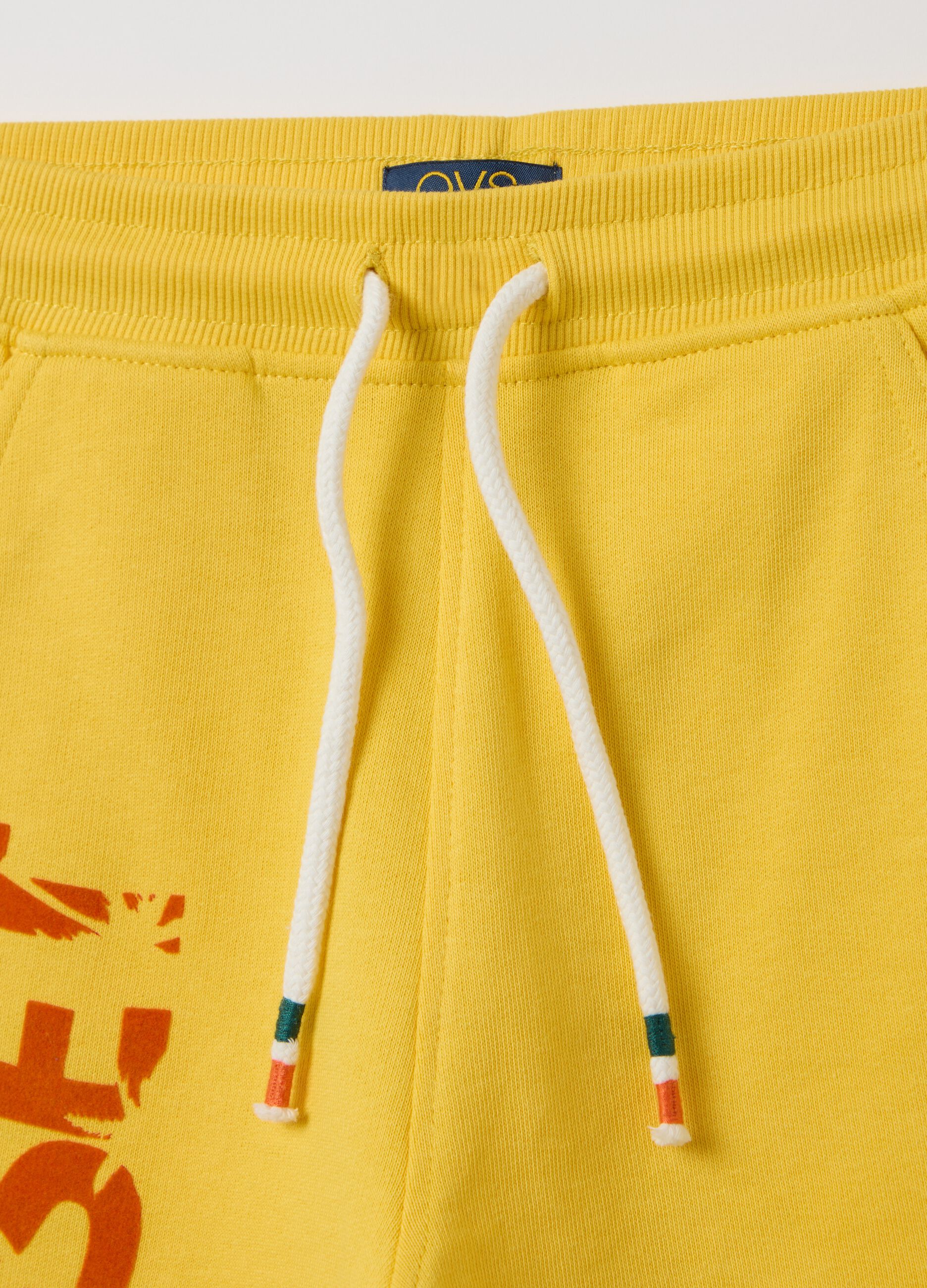 Short yellow trousers in cotton