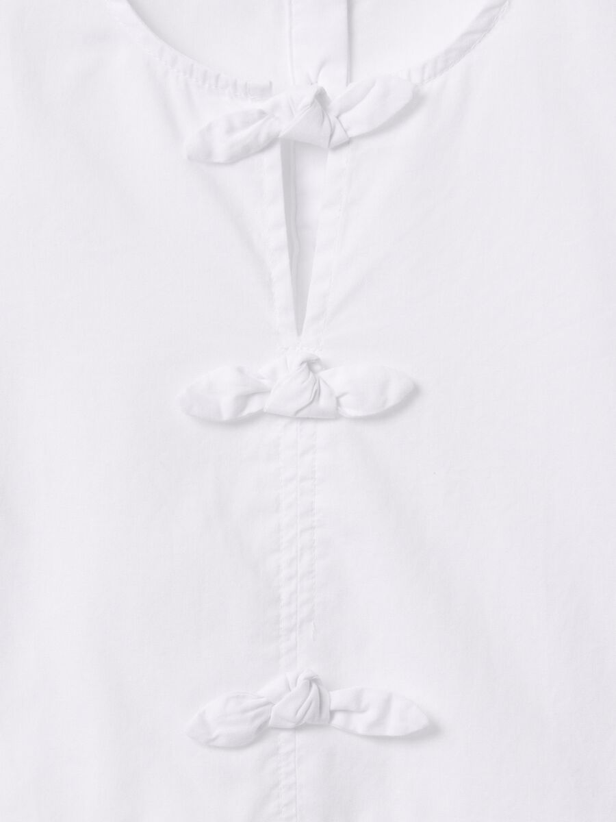 White shirt in cotton with bows_4