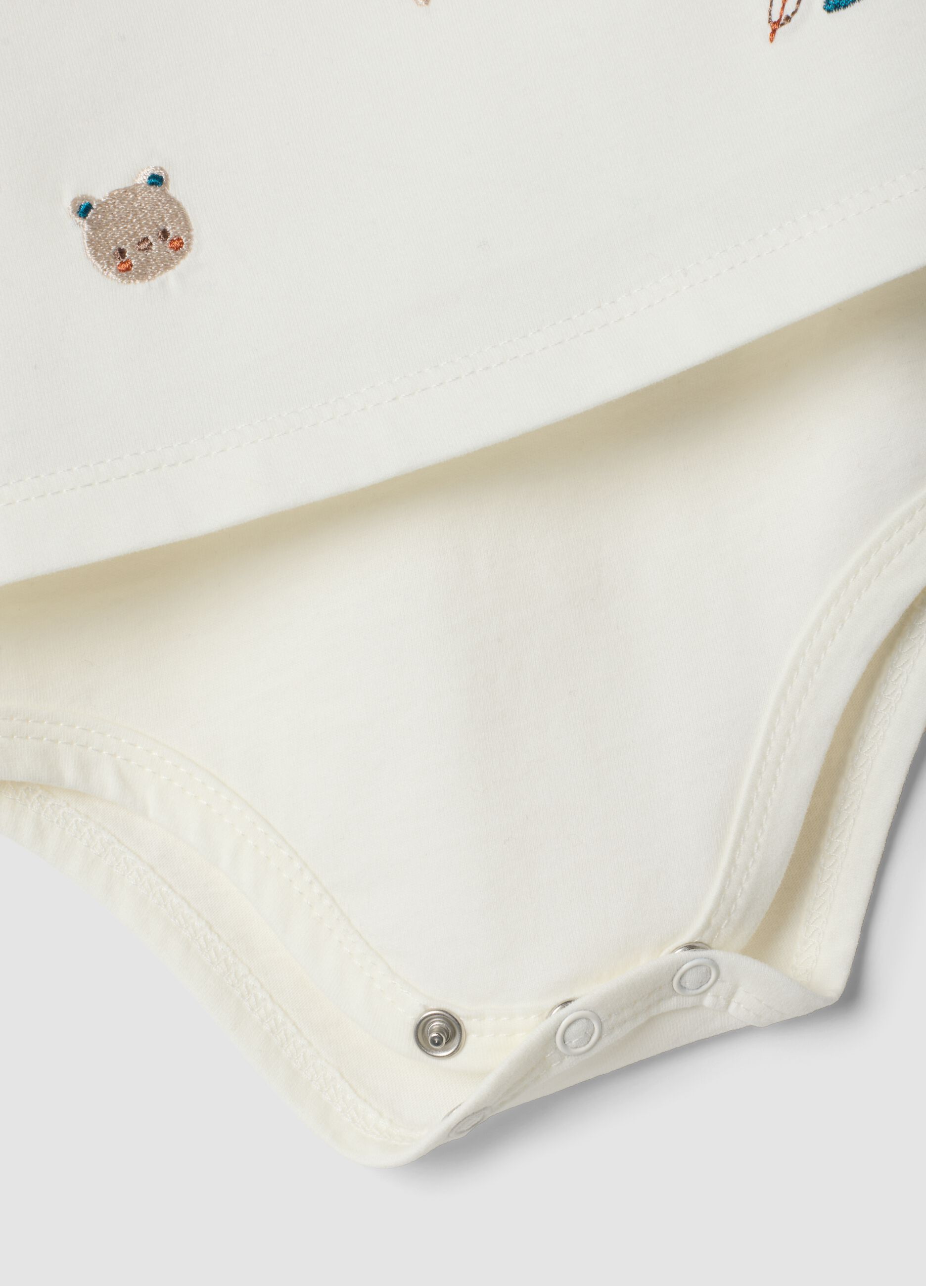 White organic cotton baby bodysuit with collar