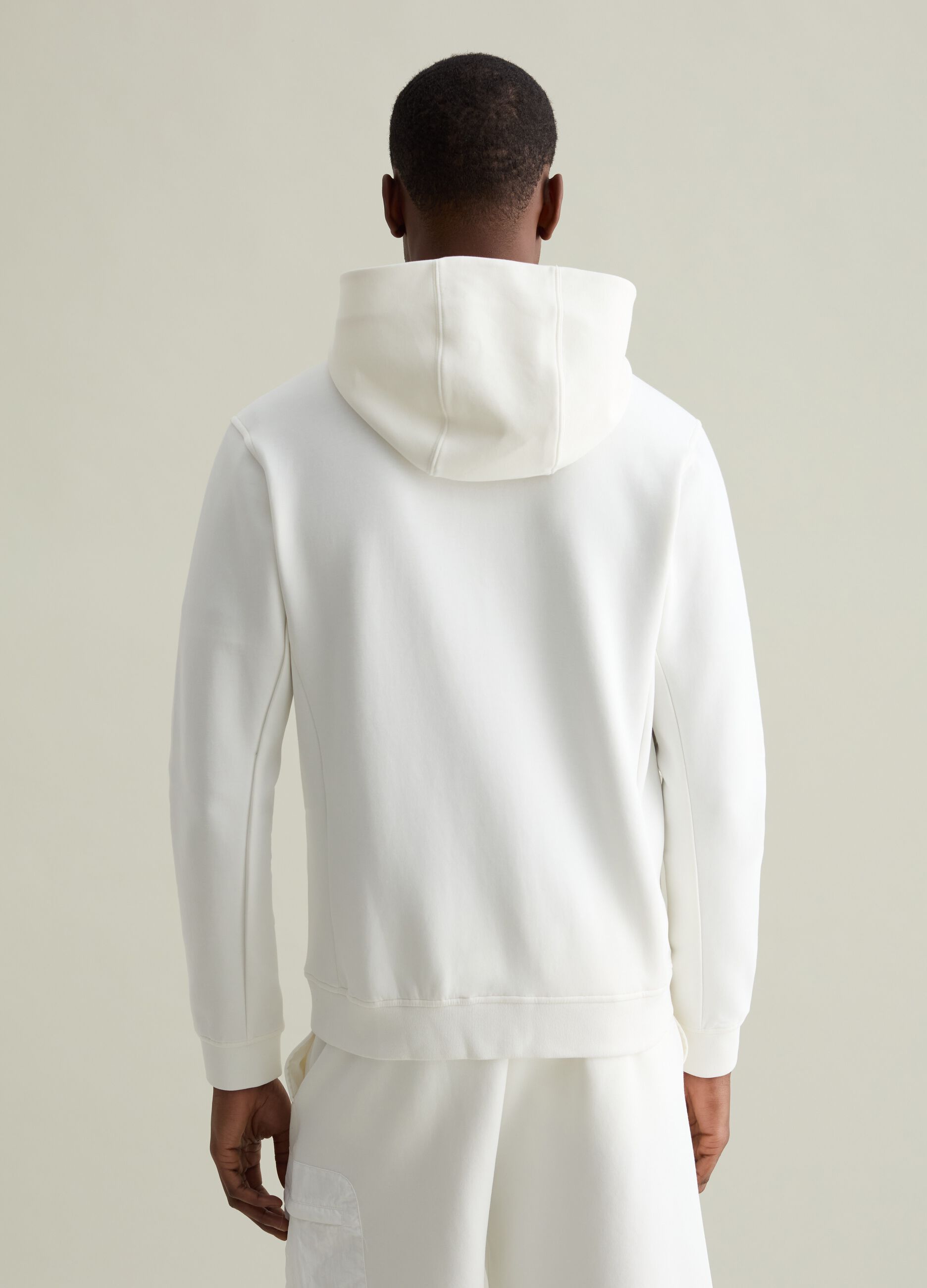 Full-zip in tessuto tecnico con cappuccio