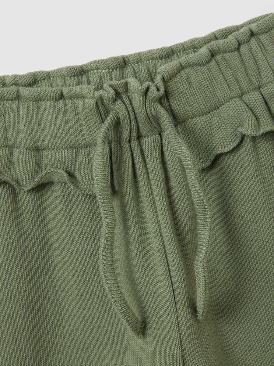 Green cotton stretch baggy trousers for girls_2