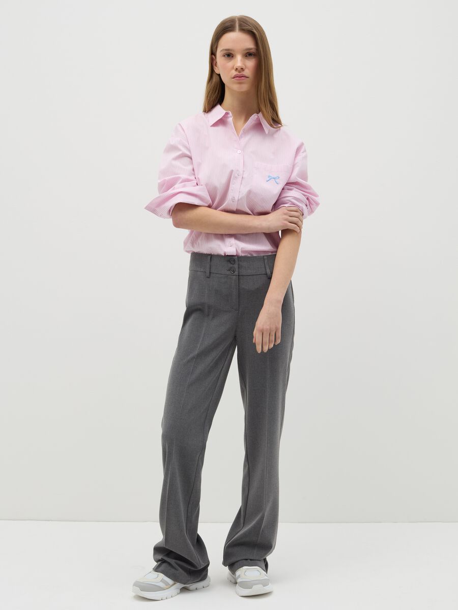Flare-fit trousers with double button_0