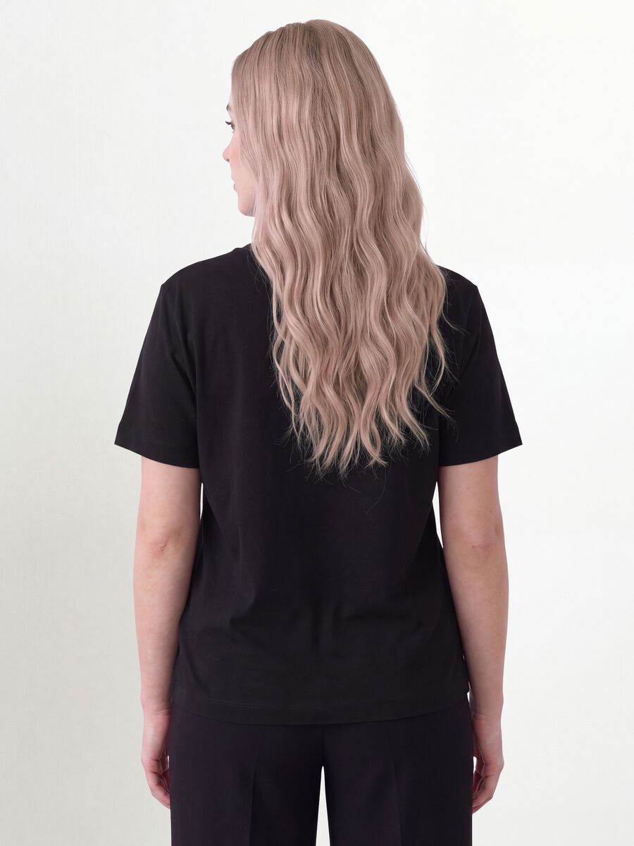 T-shirt nera in puro cotone con stampa floreale regular fit_3