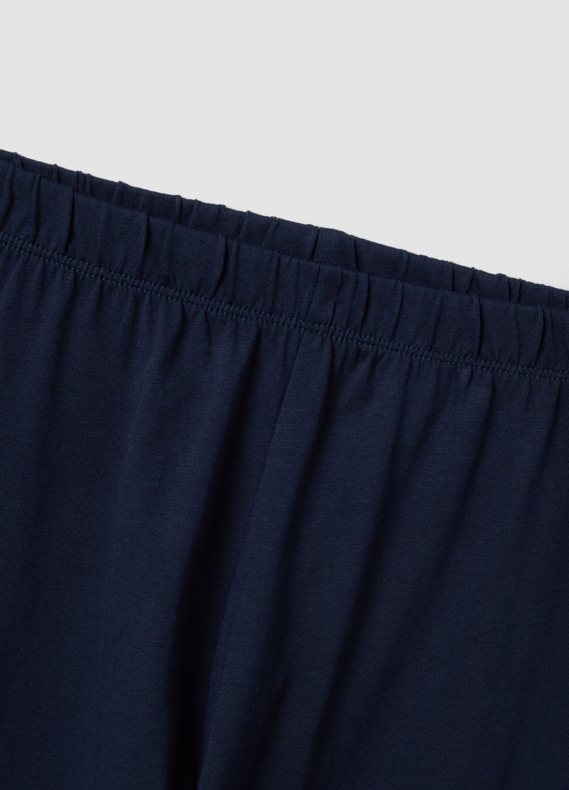 Pigiama blu in puro cotone organico con girocollo e stampa per bambino
