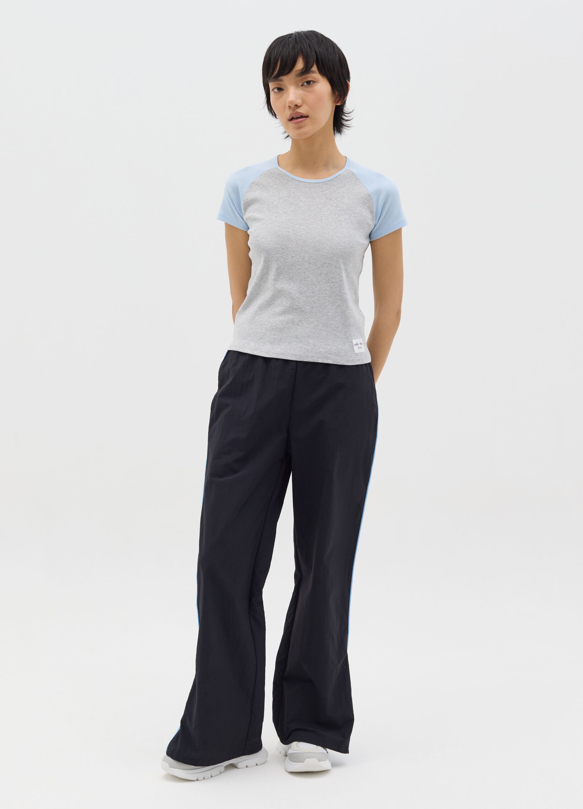 Grey T-shirt with light blue raglan sleeves