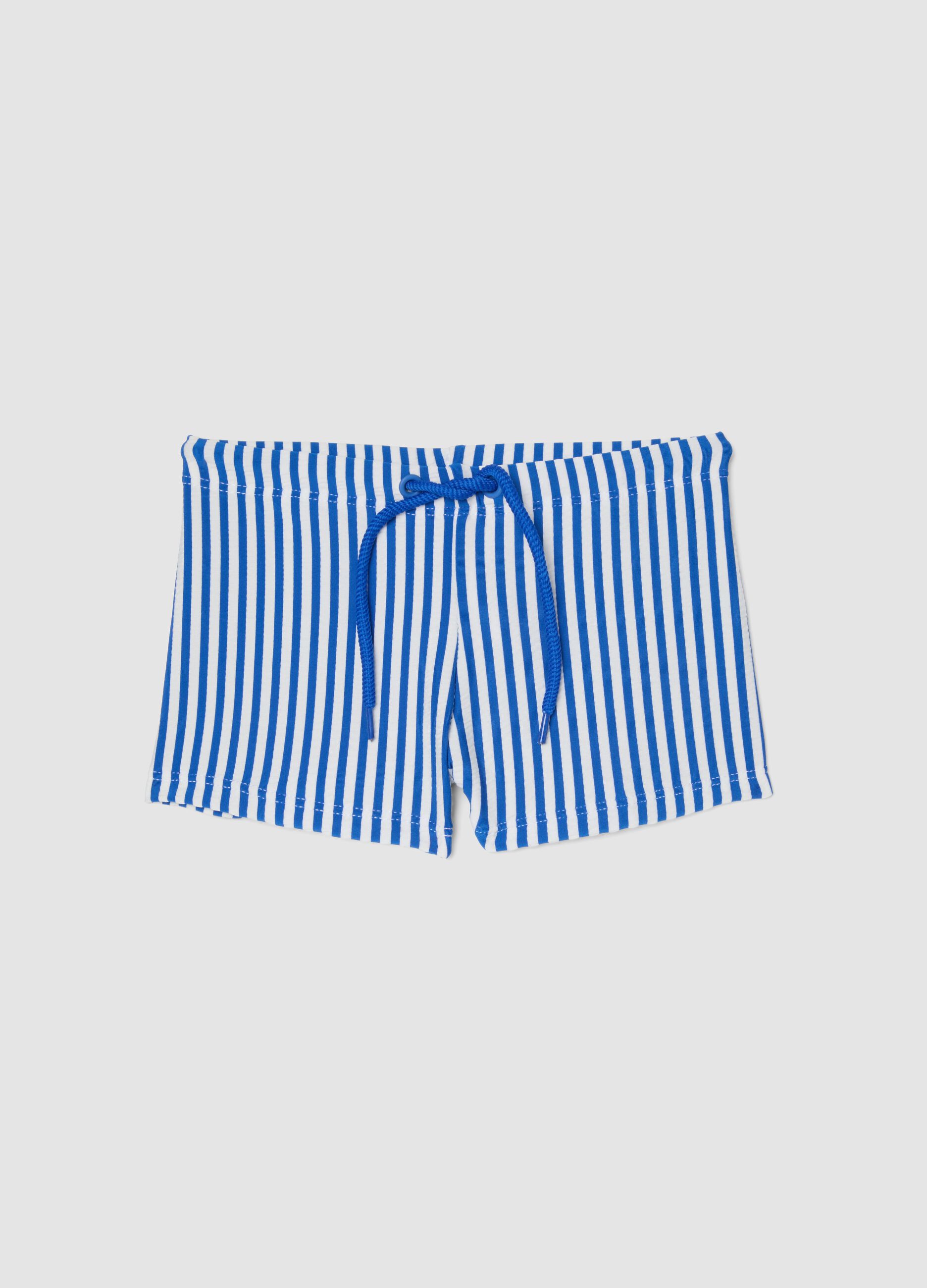 Blue and white stretch swim trunks