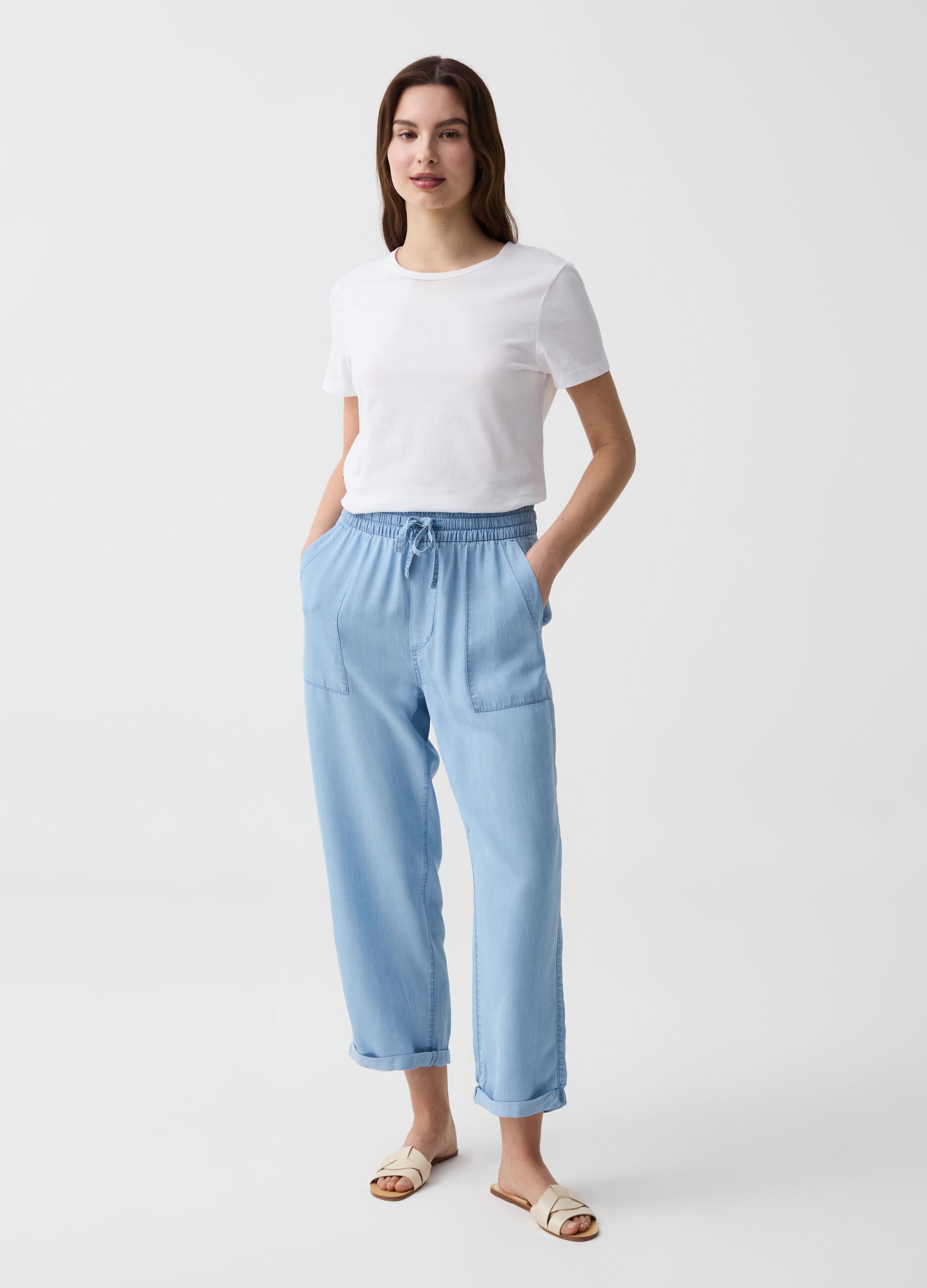 Joggers wide leg effetto denim con risvolti