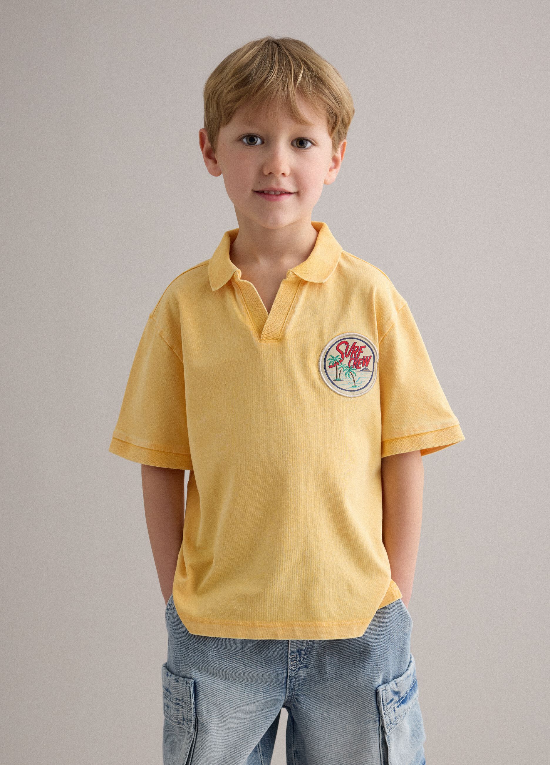Polo in puro cotone gialla da bambino regular fit con ricami