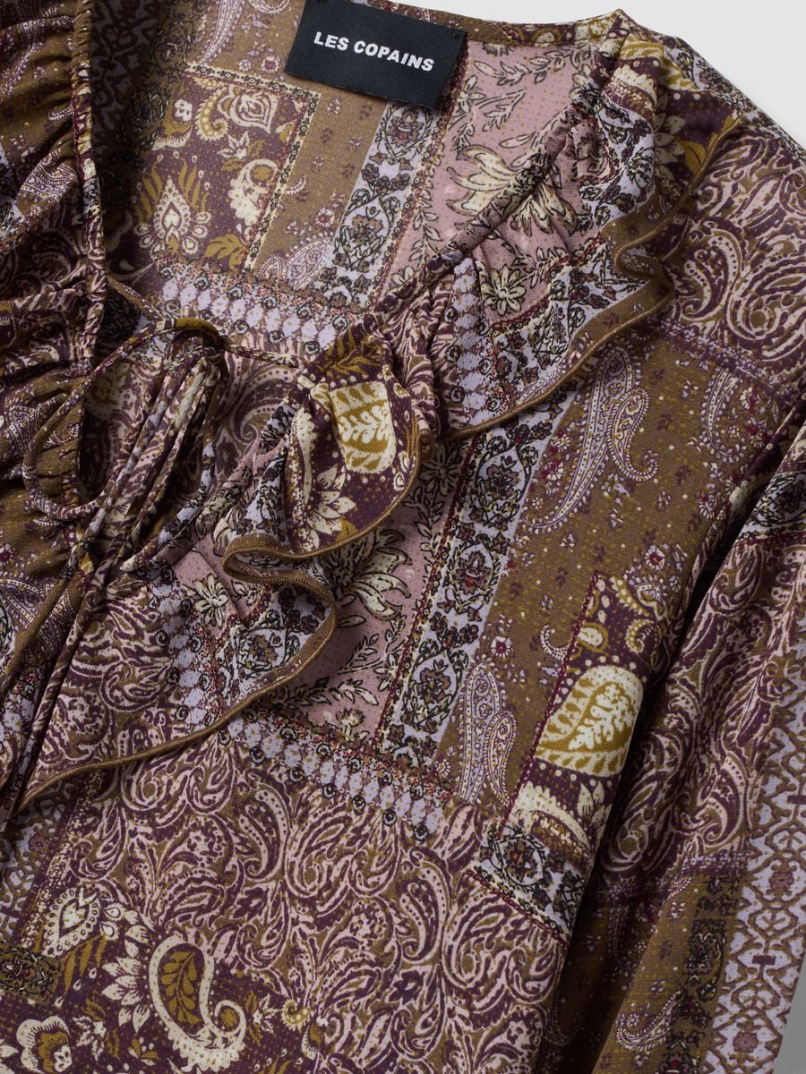 Purple patterned blouse with ruffles and tie neck_2