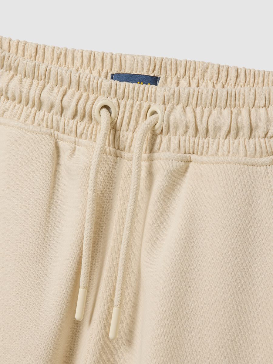 Girls' beige regular fit jogging trousers in pure cotton_2