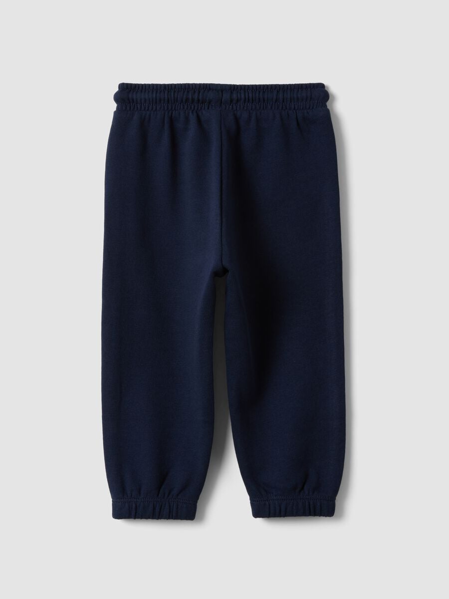 Pantaloni jogger blu in puro cotone organico con coulisse per bimbo_1