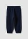 Pantaloni jogger blu in puro cotone organico con coulisse per bimbo_1