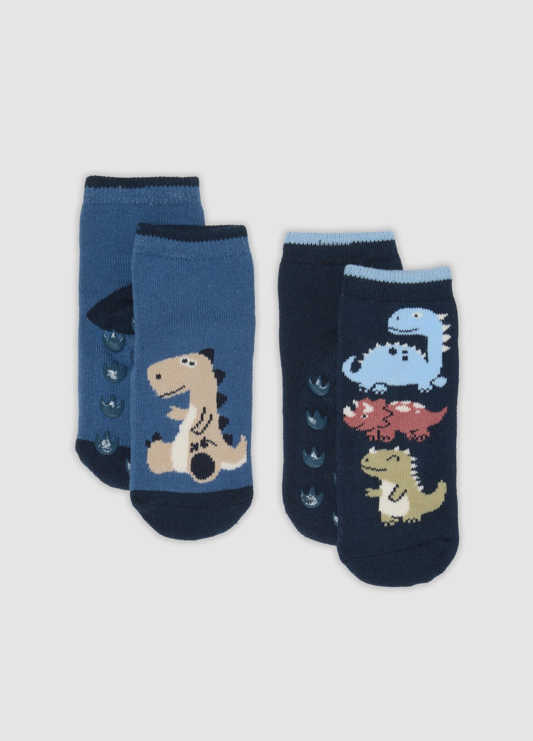 2-pack of blue non-slip socks in organic stretch cotton with dinosaur print