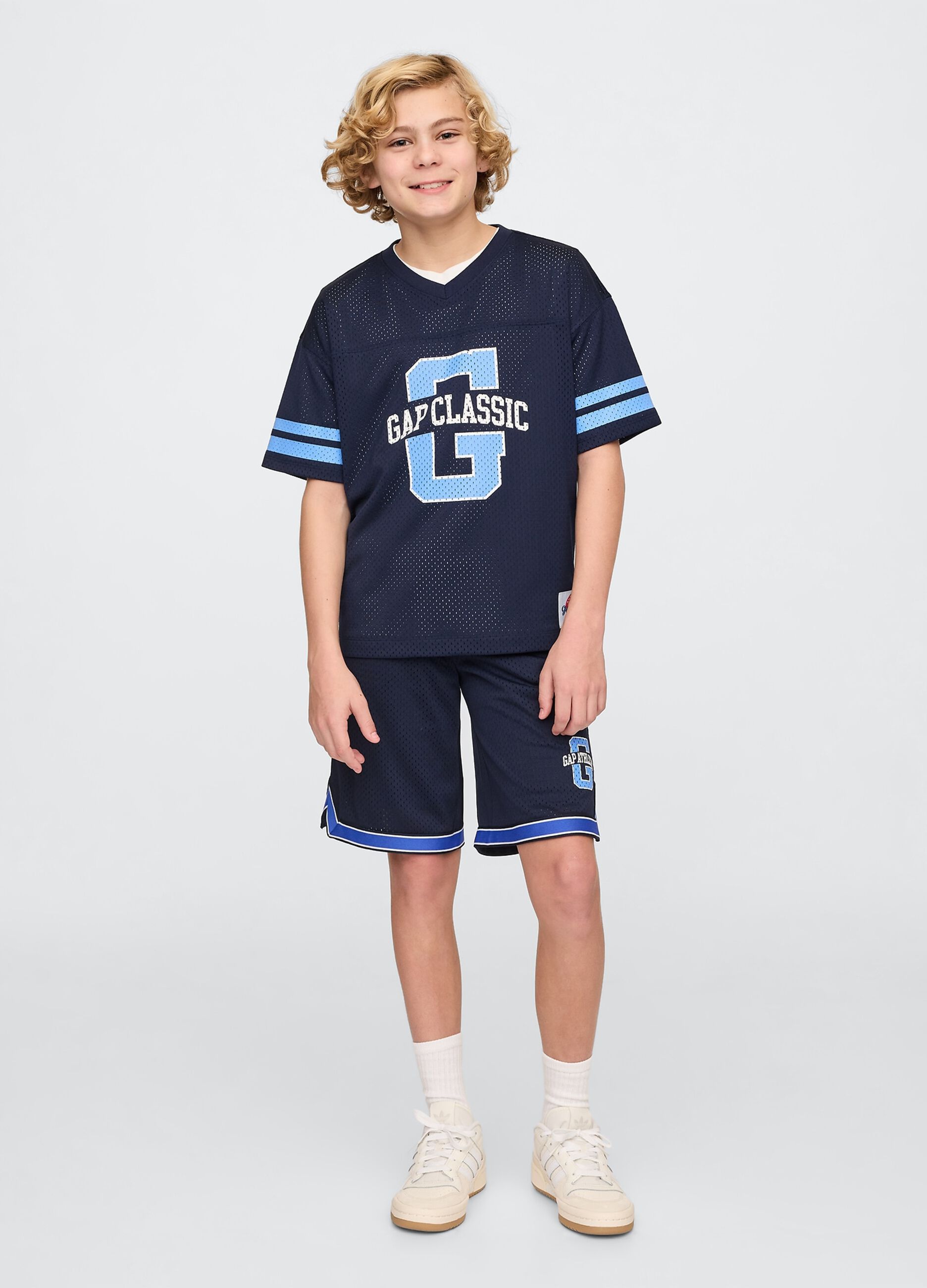 Blue sports jersey with logo and light blue accents