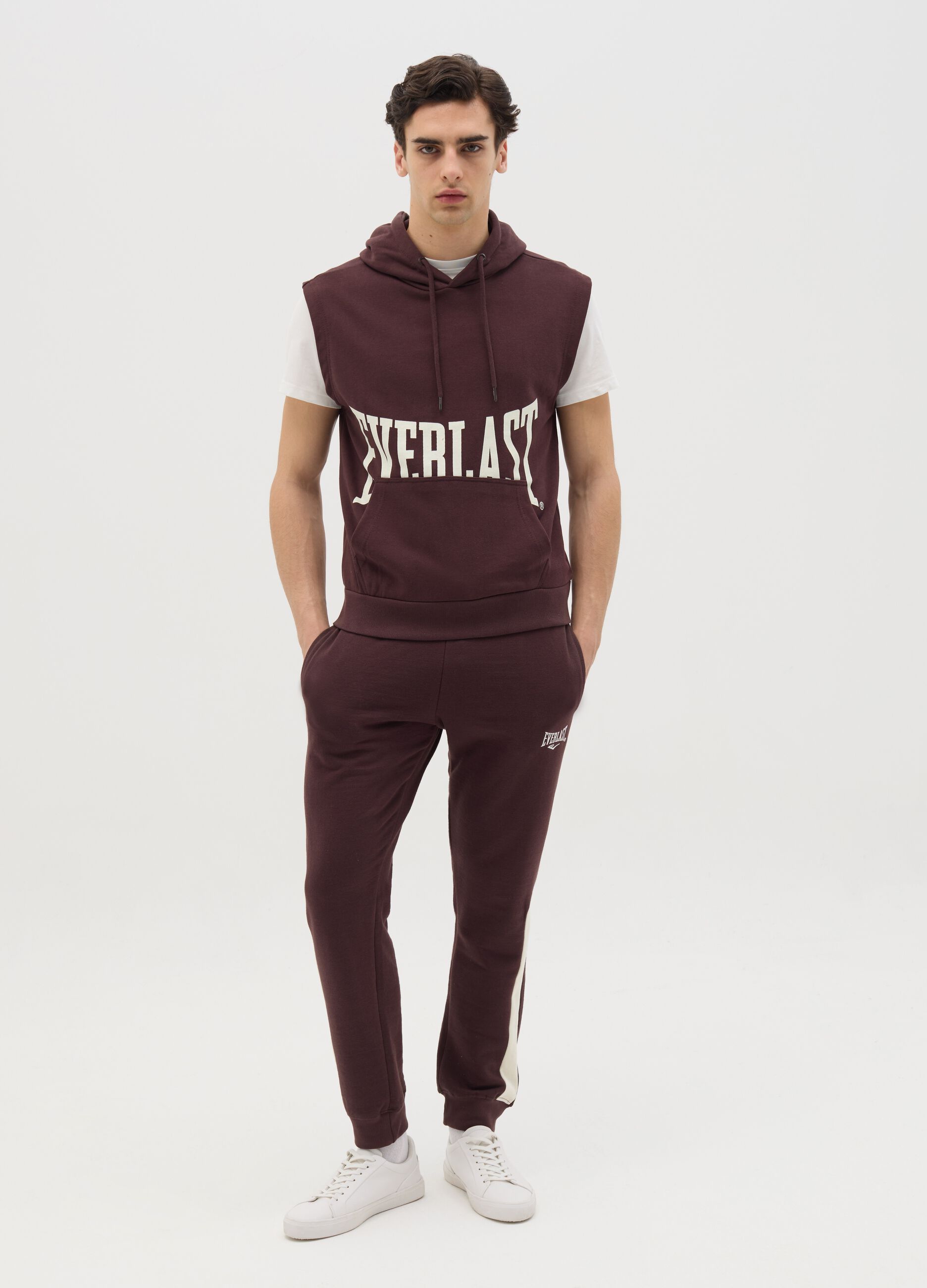 Joggers with contrasting inserts and logo embroidery