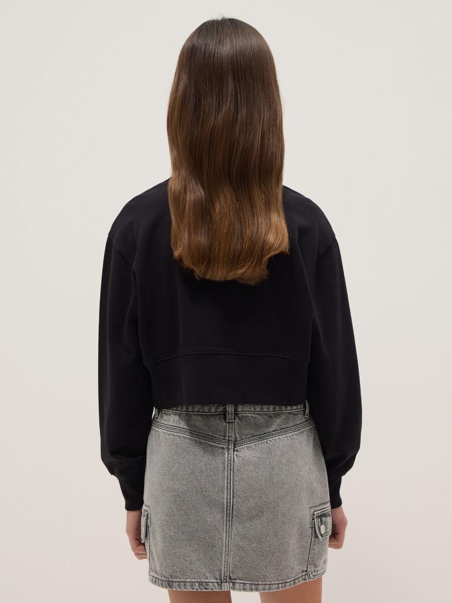 Girl's black crew-neck sweatshirt in pure cotton regular fit_1