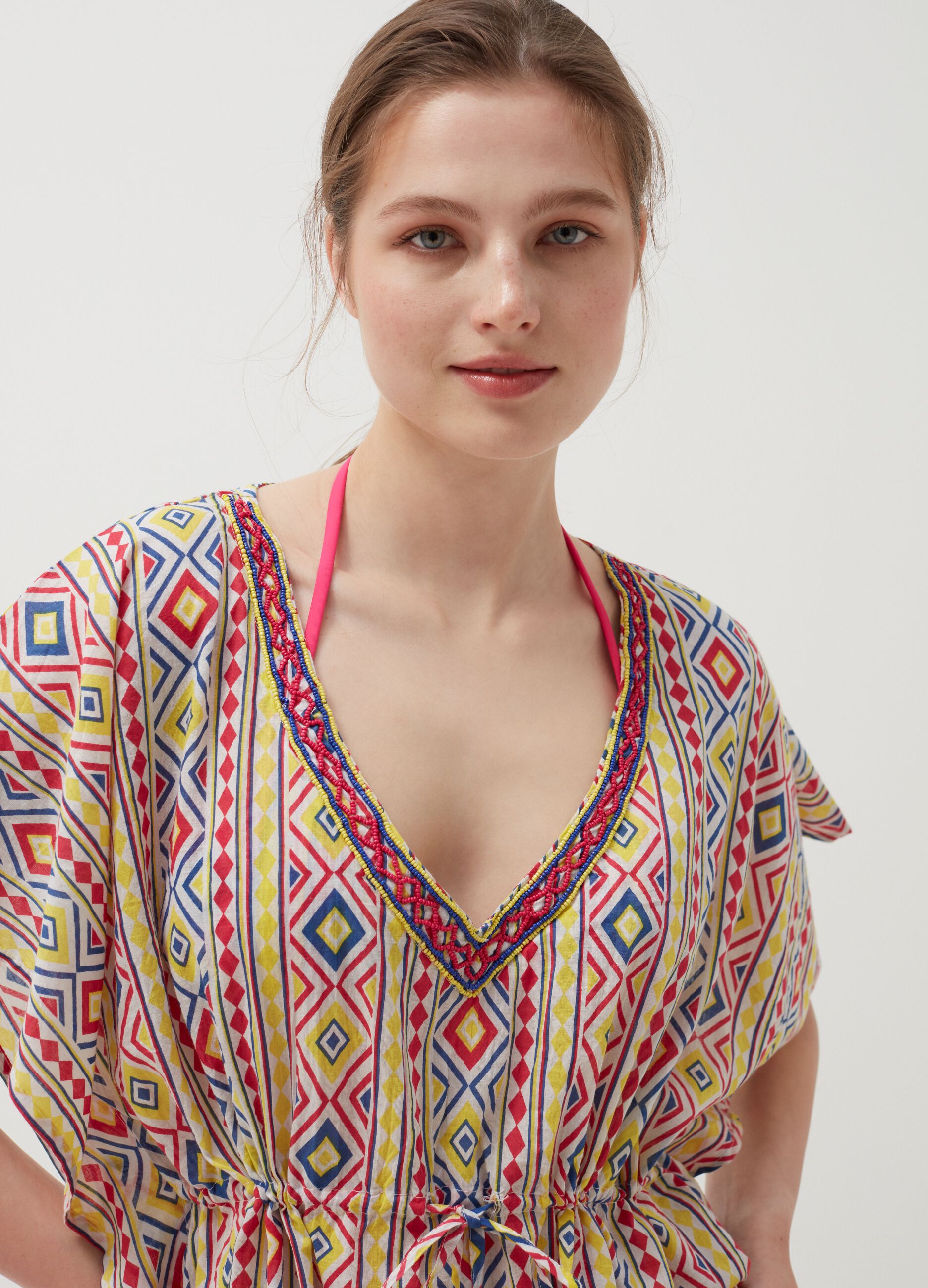 Beach cover-up poncho with ethnic pattern