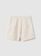 Beige wide-leg girls' shorts with pleated details_1
