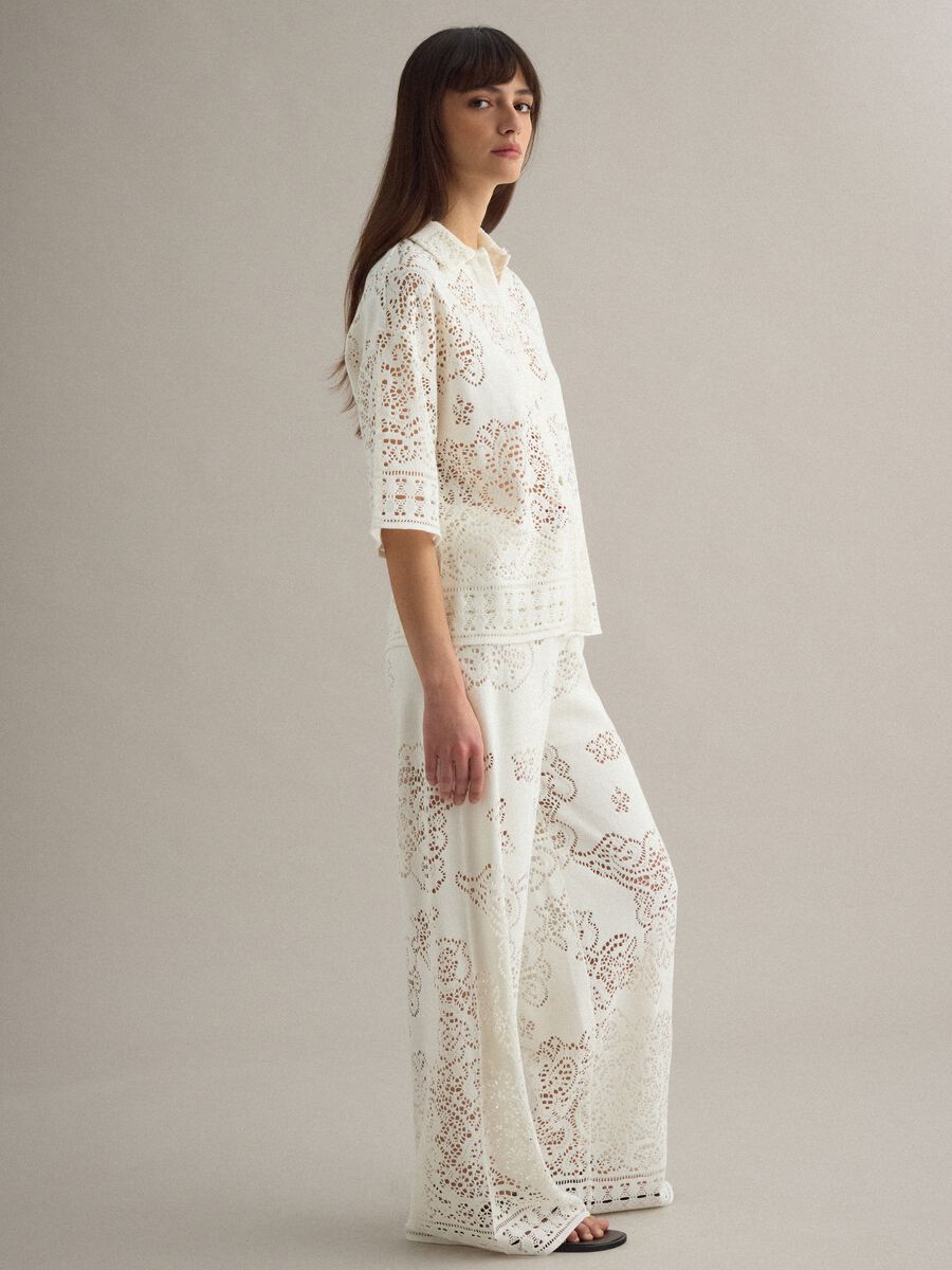 White wide leg cotton blend trousers with perforated texture_2