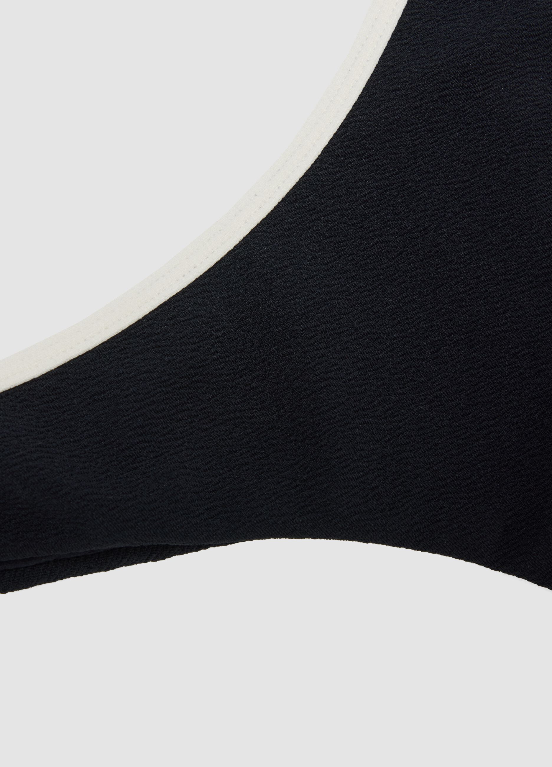 Black stretch swim briefs with white trim