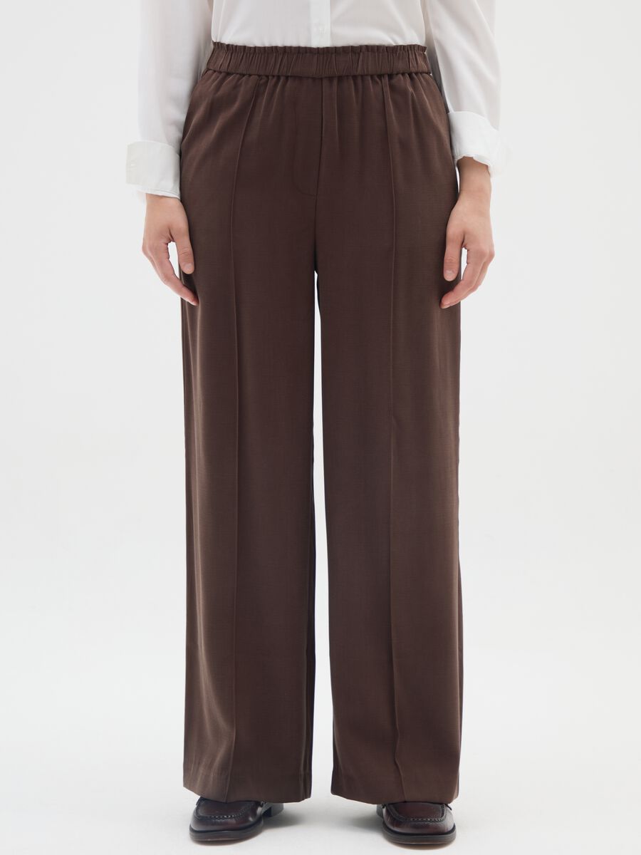 Pantaloni The Iconic Pants marroni a gamba larga_1