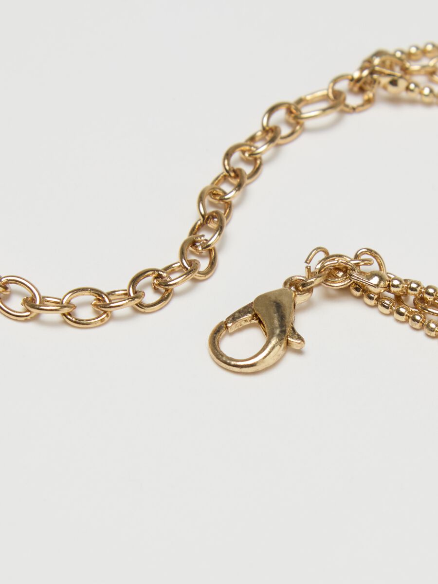 Long necklace with chain pendants_2