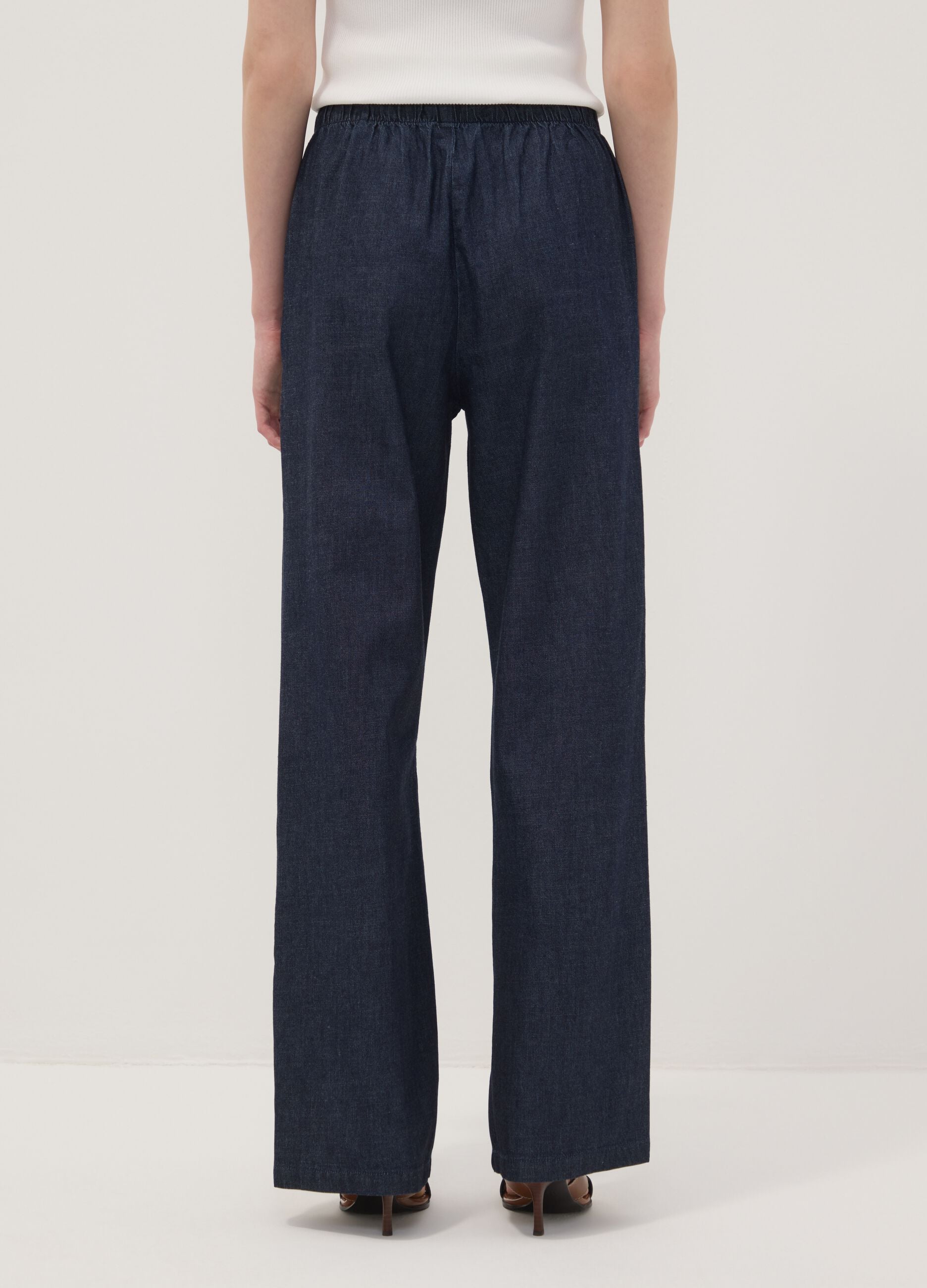 Pantaloni denim blu in puro cotone wide leg con coulisse