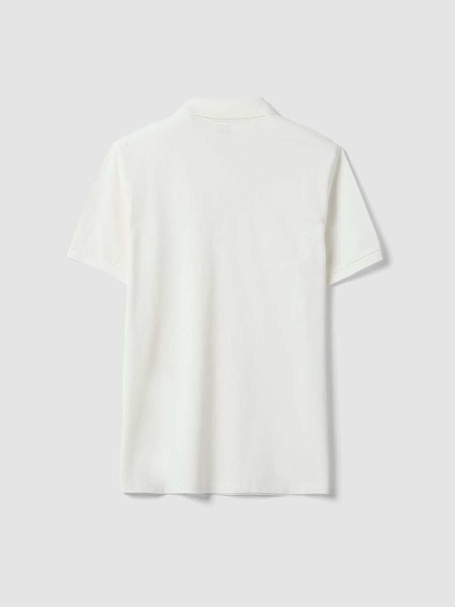 Polo bianca in puro cotone piquet con colletto classico regular fit_1