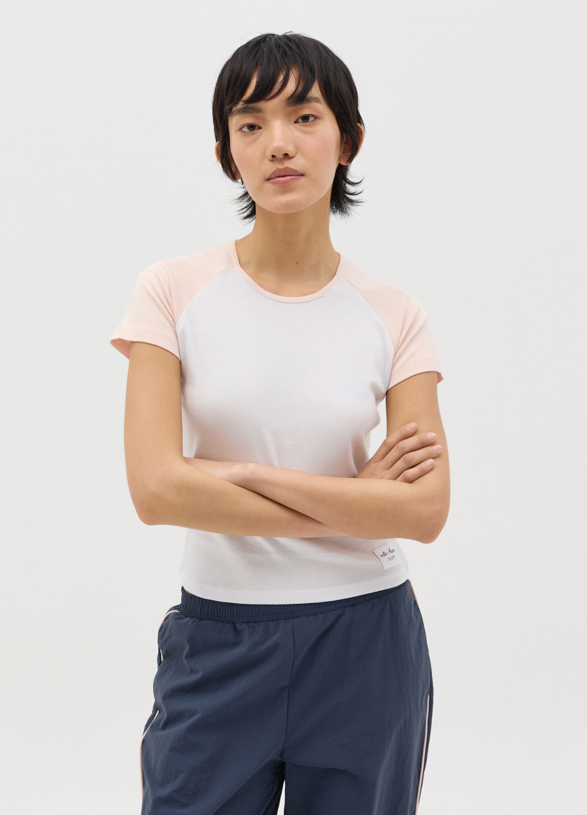 White T-shirt with pink raglan sleeves