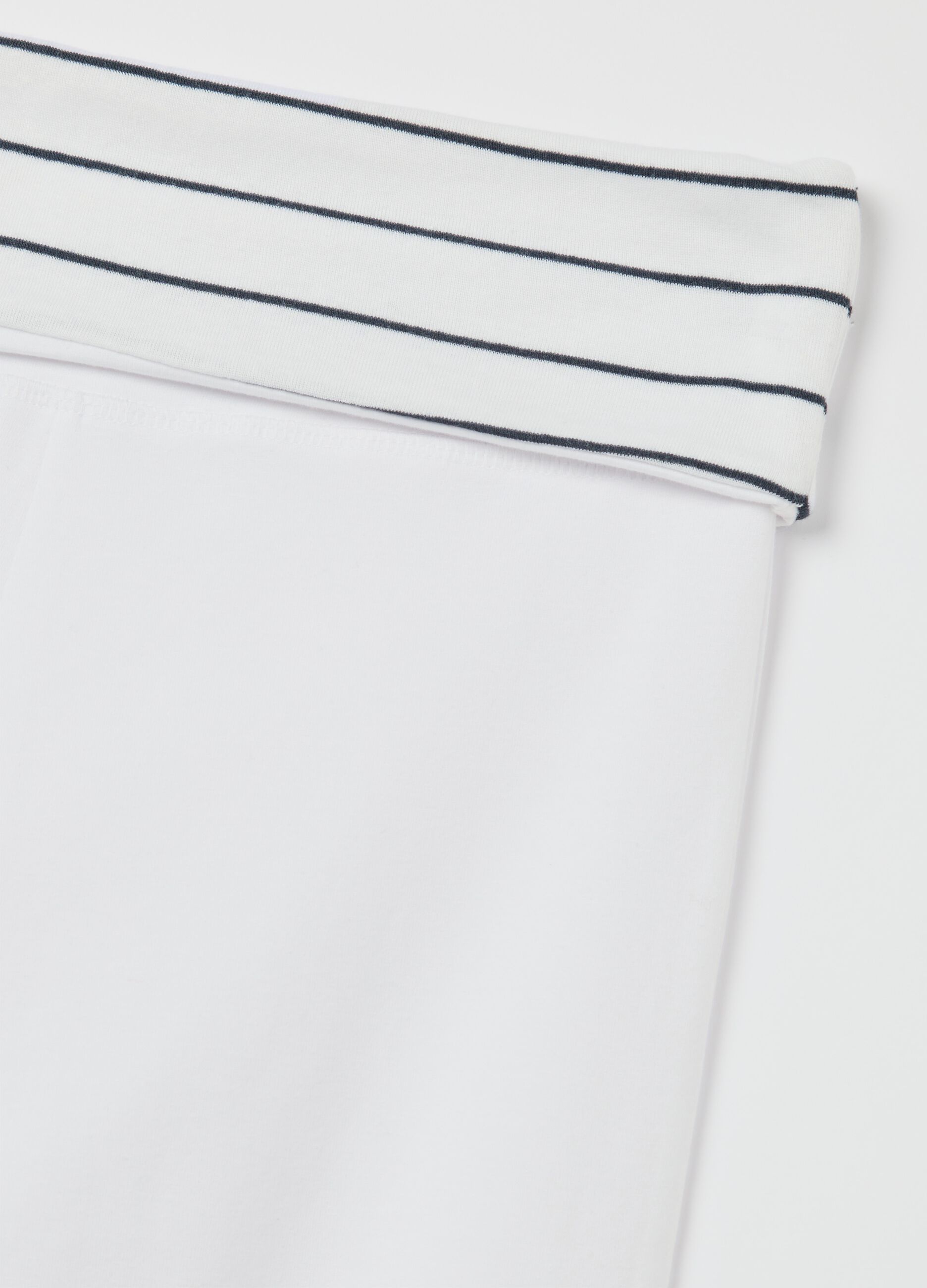 White flare-fit leggings with striped fold at the waist