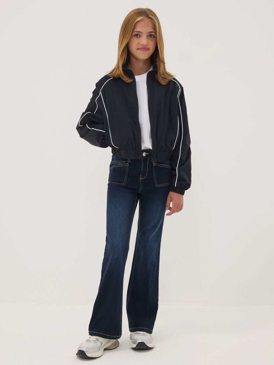Jeans blu flare in cotone elasticizzato per ragazza_0