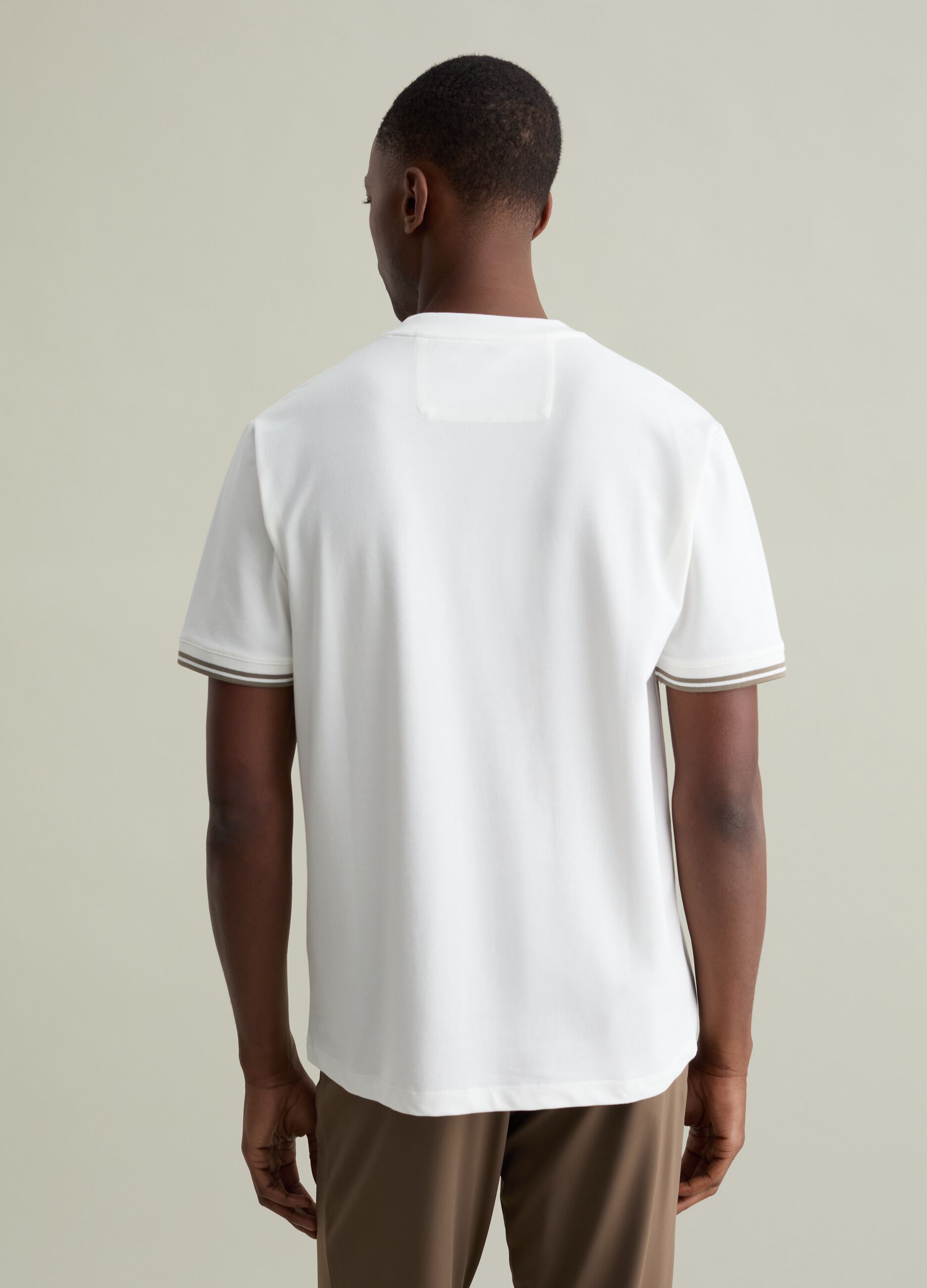 T-shirt with striped details and pocket