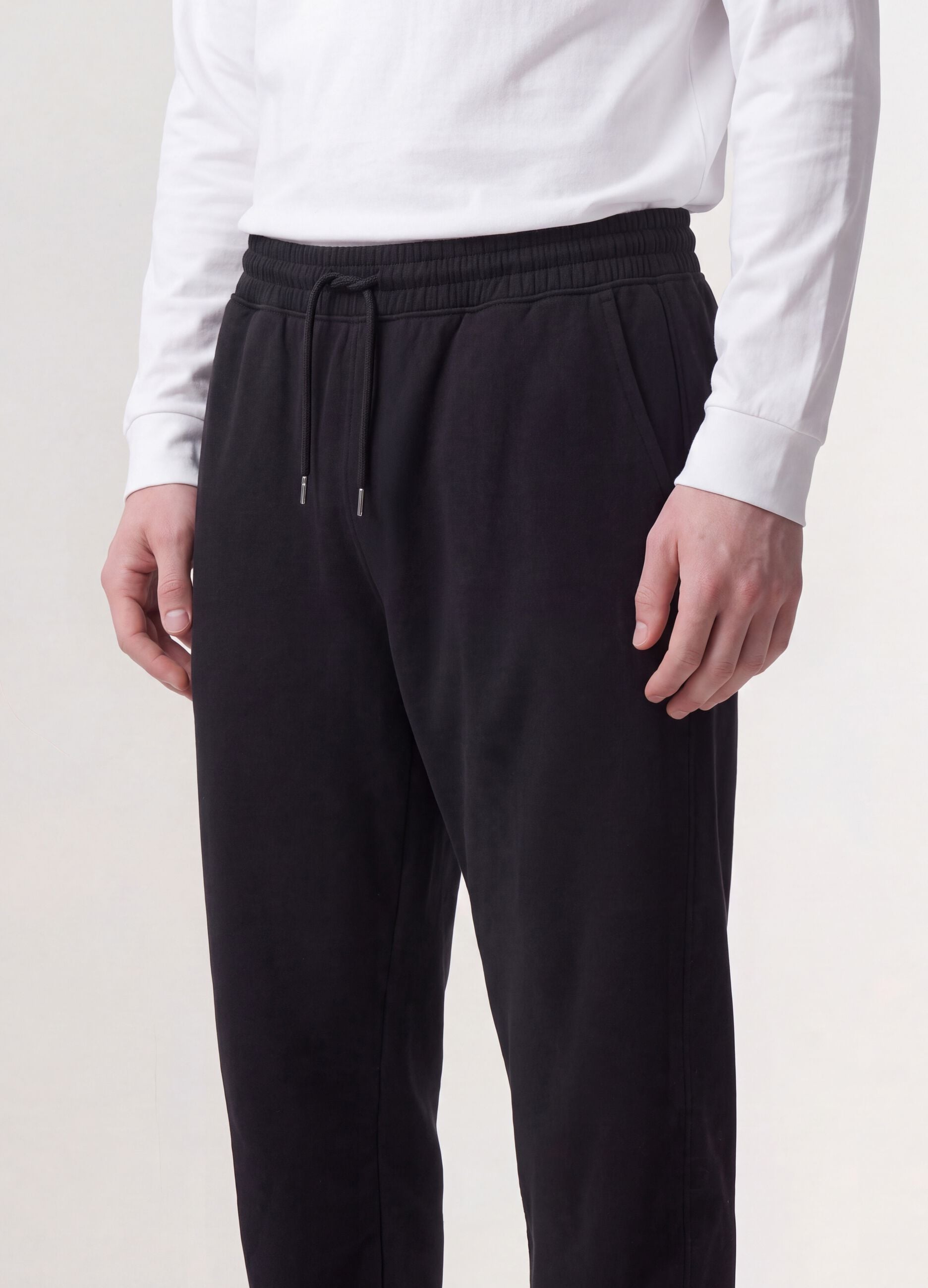 Jogger neri in misto cotone con fondo a polsino e coulisse