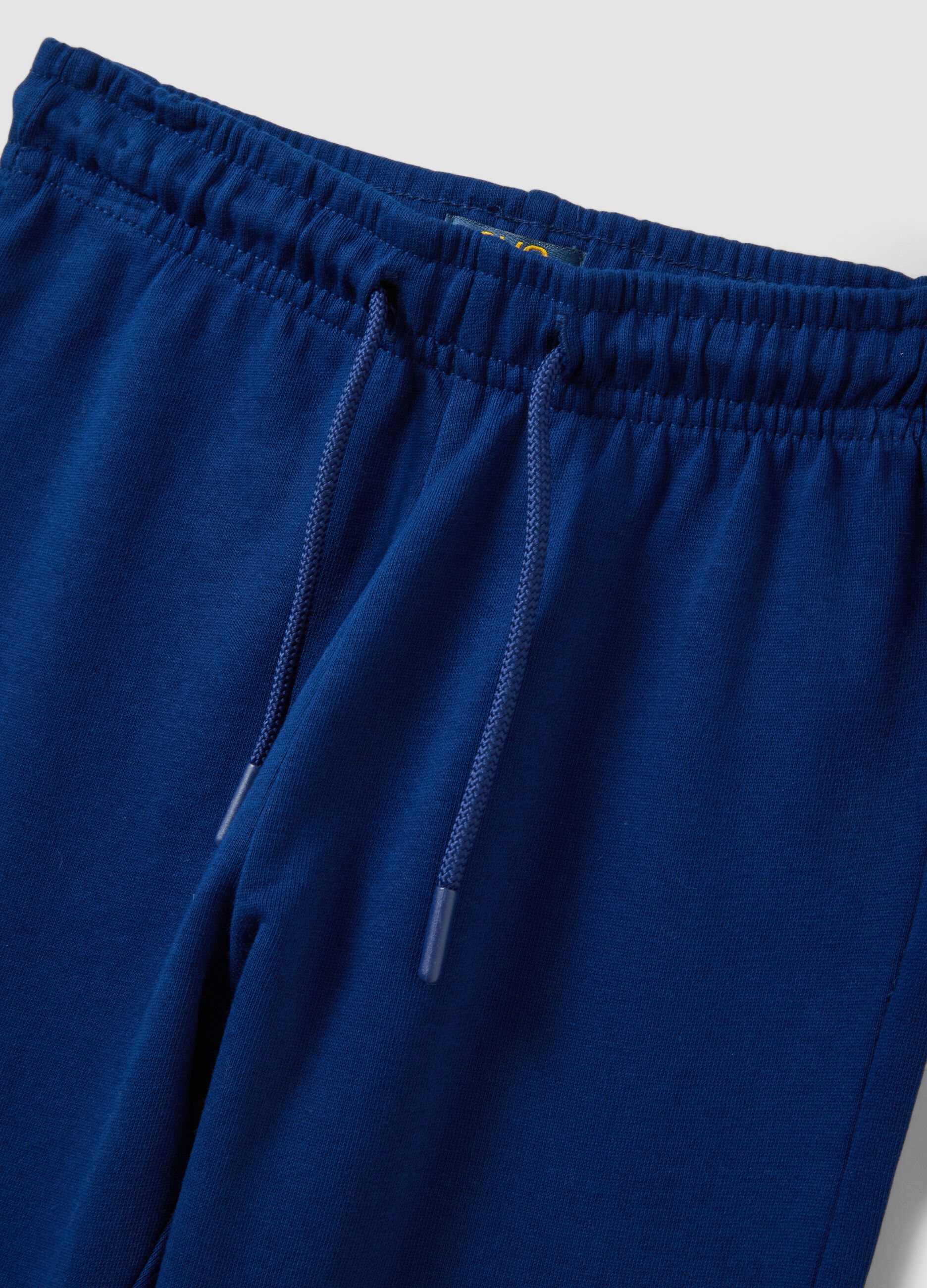 Tuta blu in puro cotone con girocollo