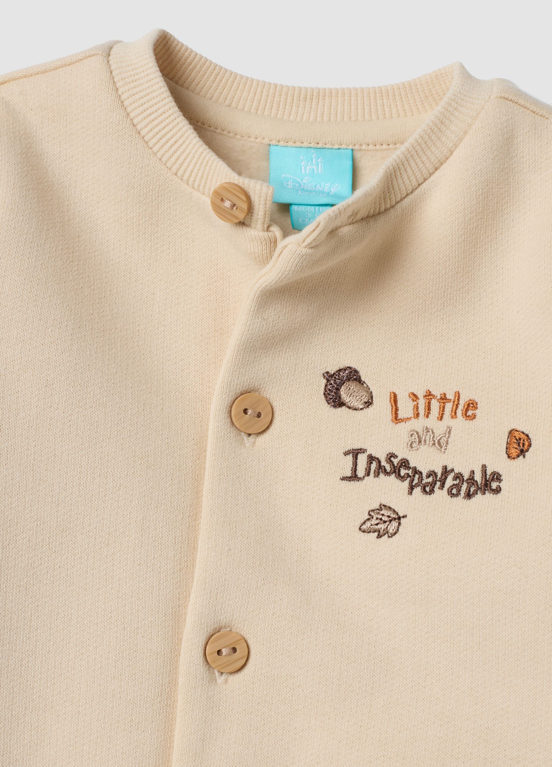 Sand romper in pure organic cotton with buttons and Chip & Dale embroidery