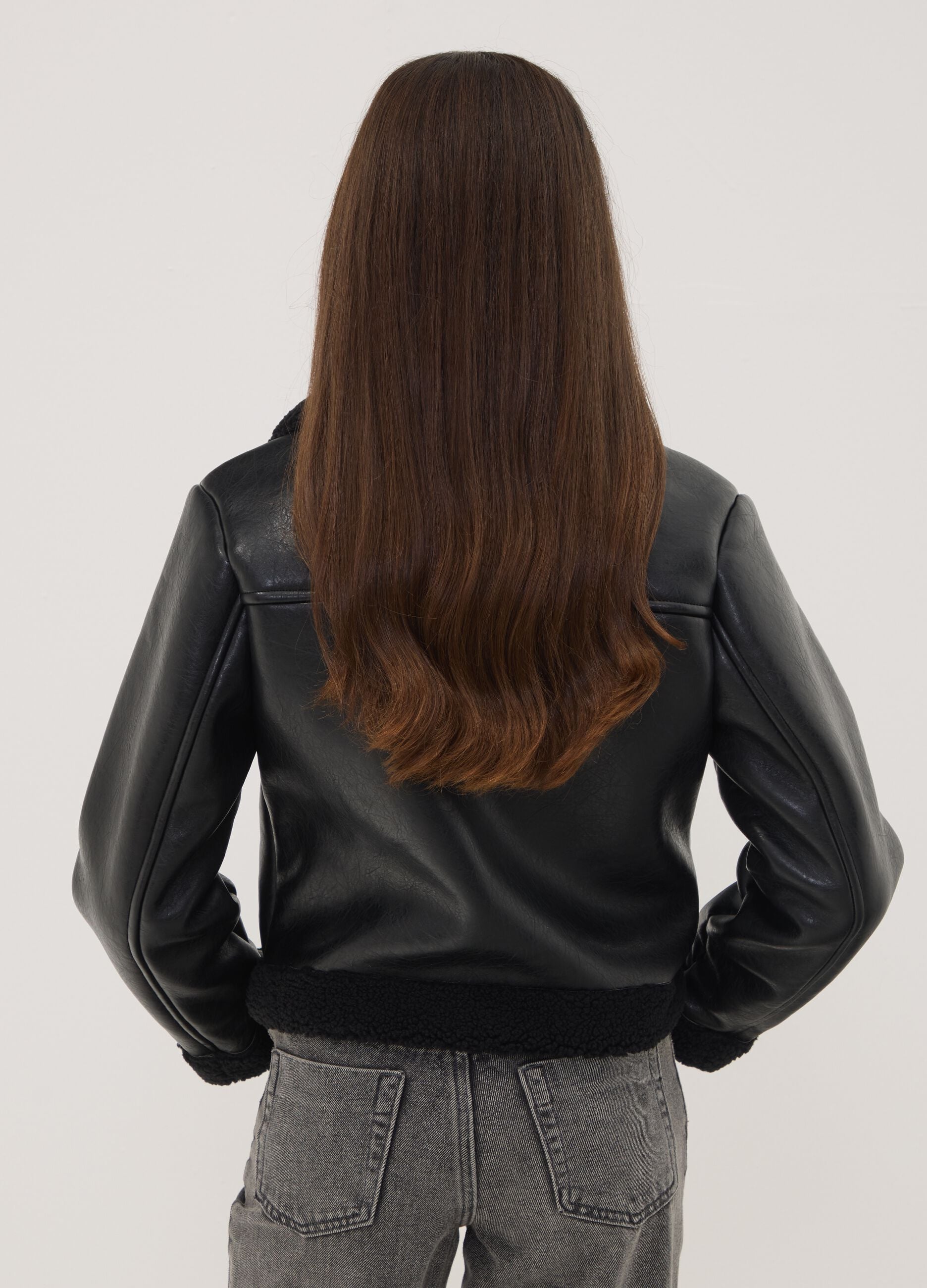 Black aviator-style jacket with diagonal zip