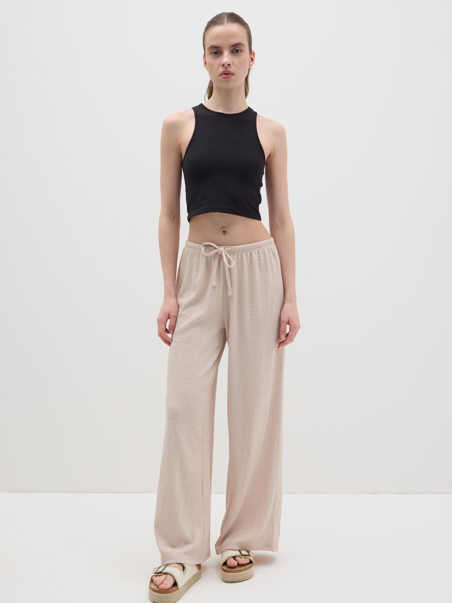 Women's beige regular-fit palazzo pants in stretch fabric._0