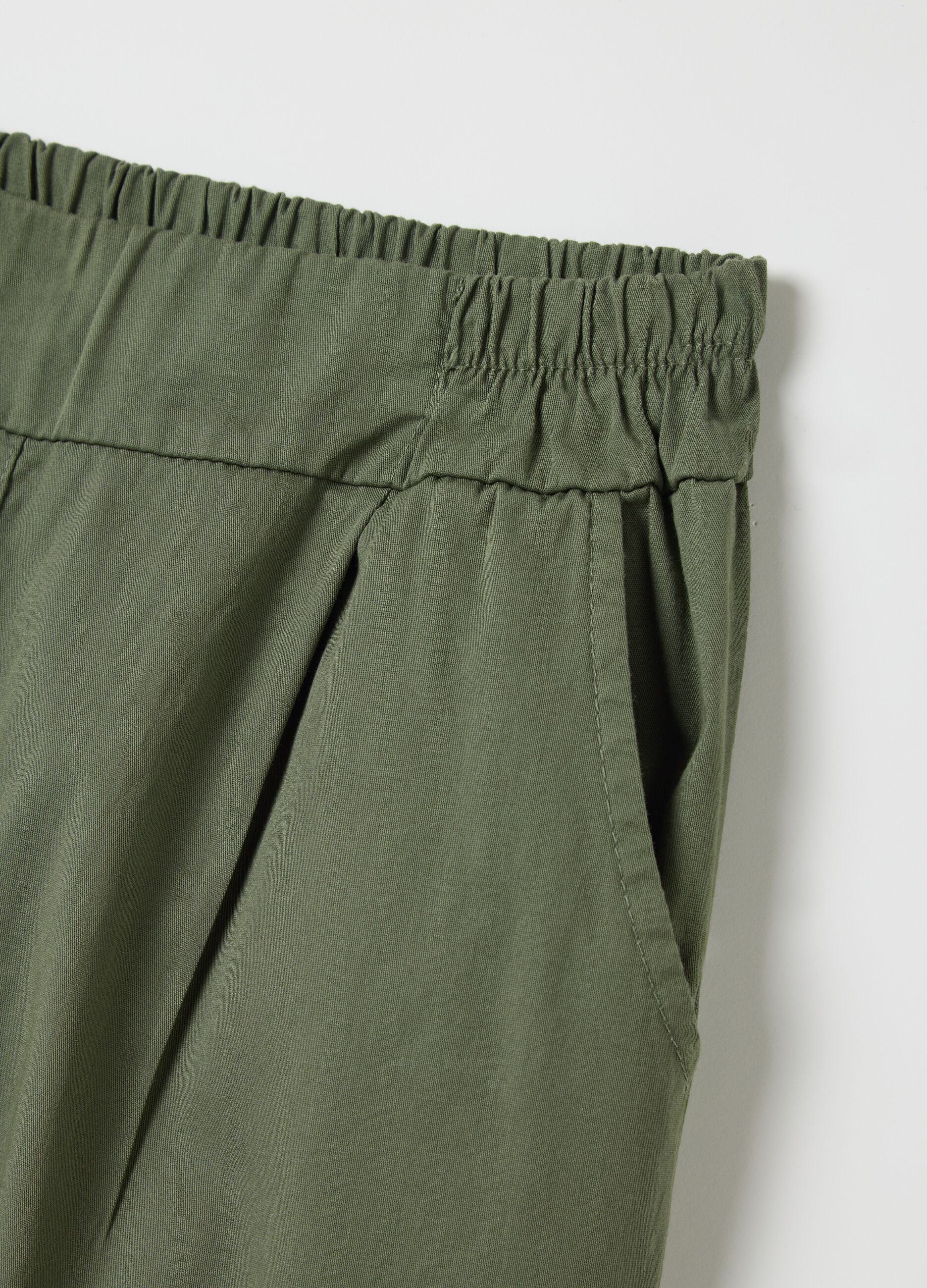 Green cigarette trousers with elastic waistband