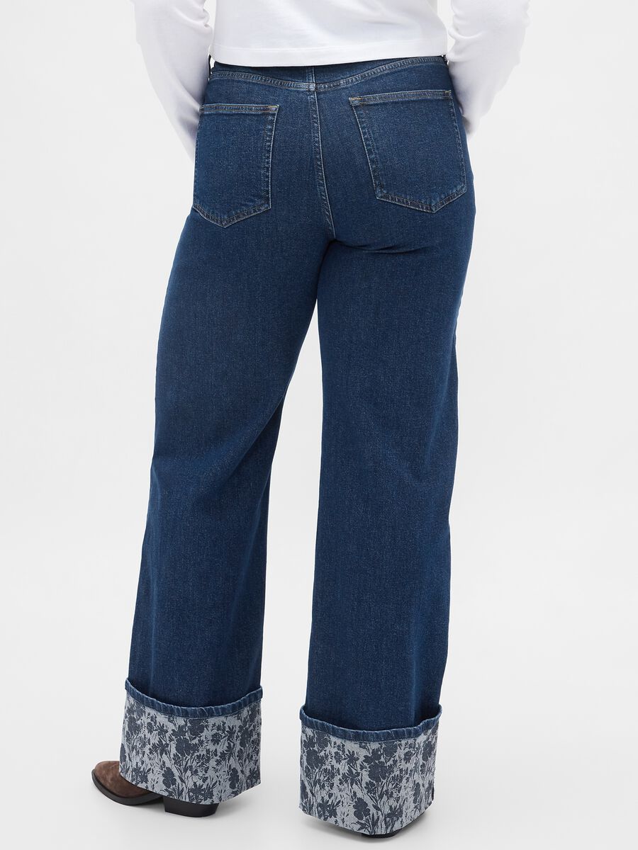 Wide denim trousers with floral turn-up_5