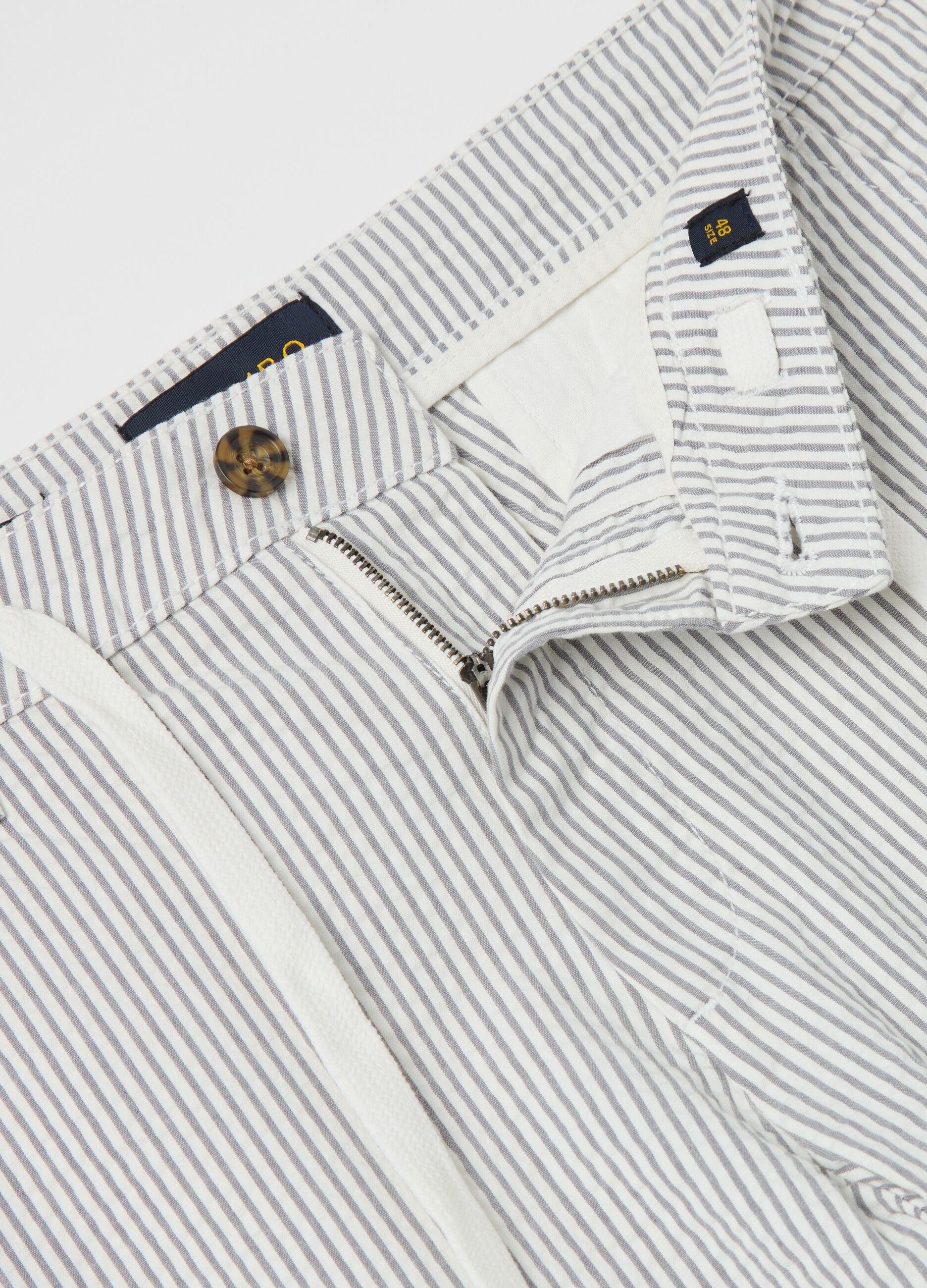 Seersucker chino trousers with white and grey stripes