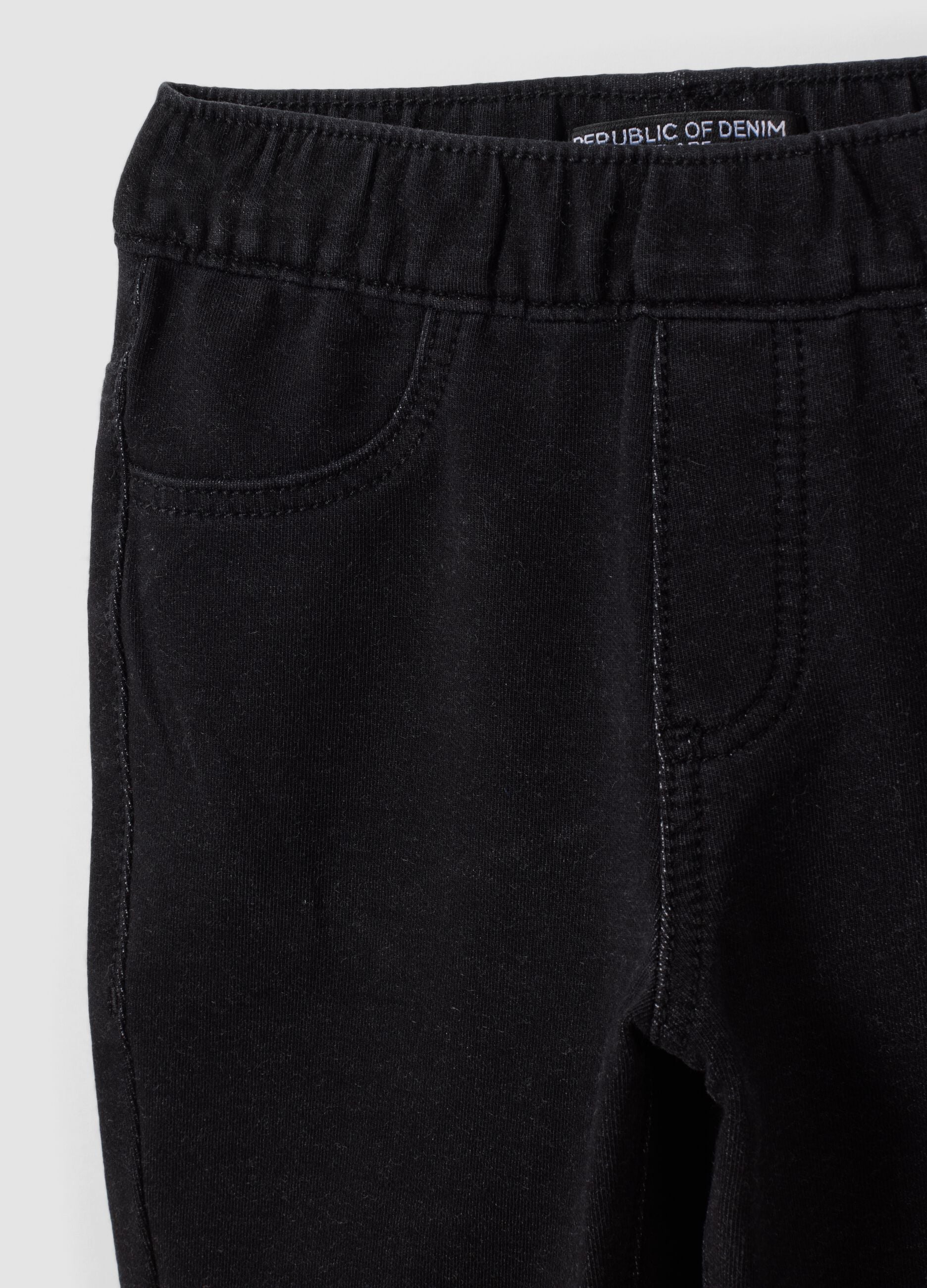 Jeggings nero flare in cotone elasticizzato per bambina