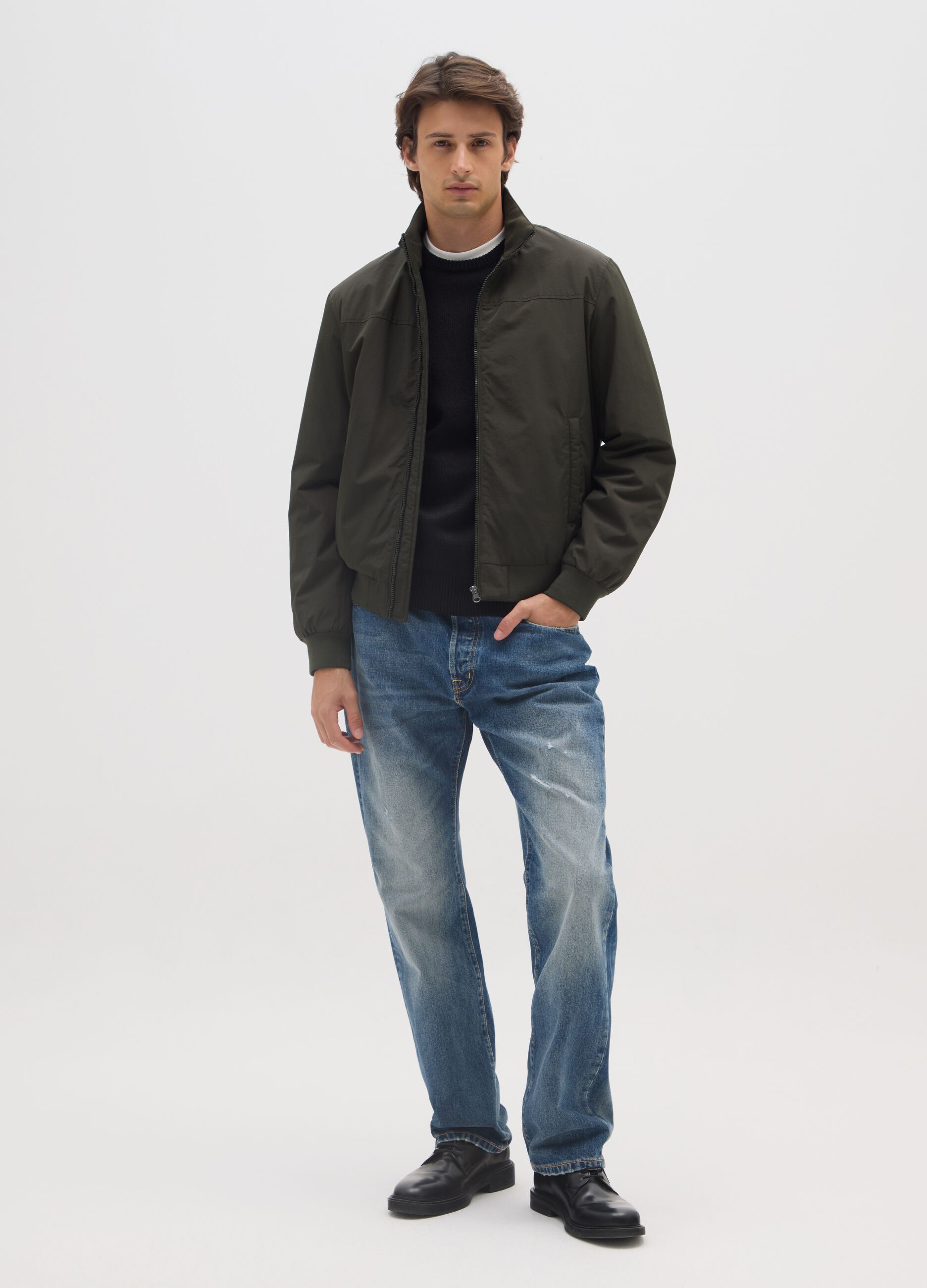 Green padded jacket with zip closure